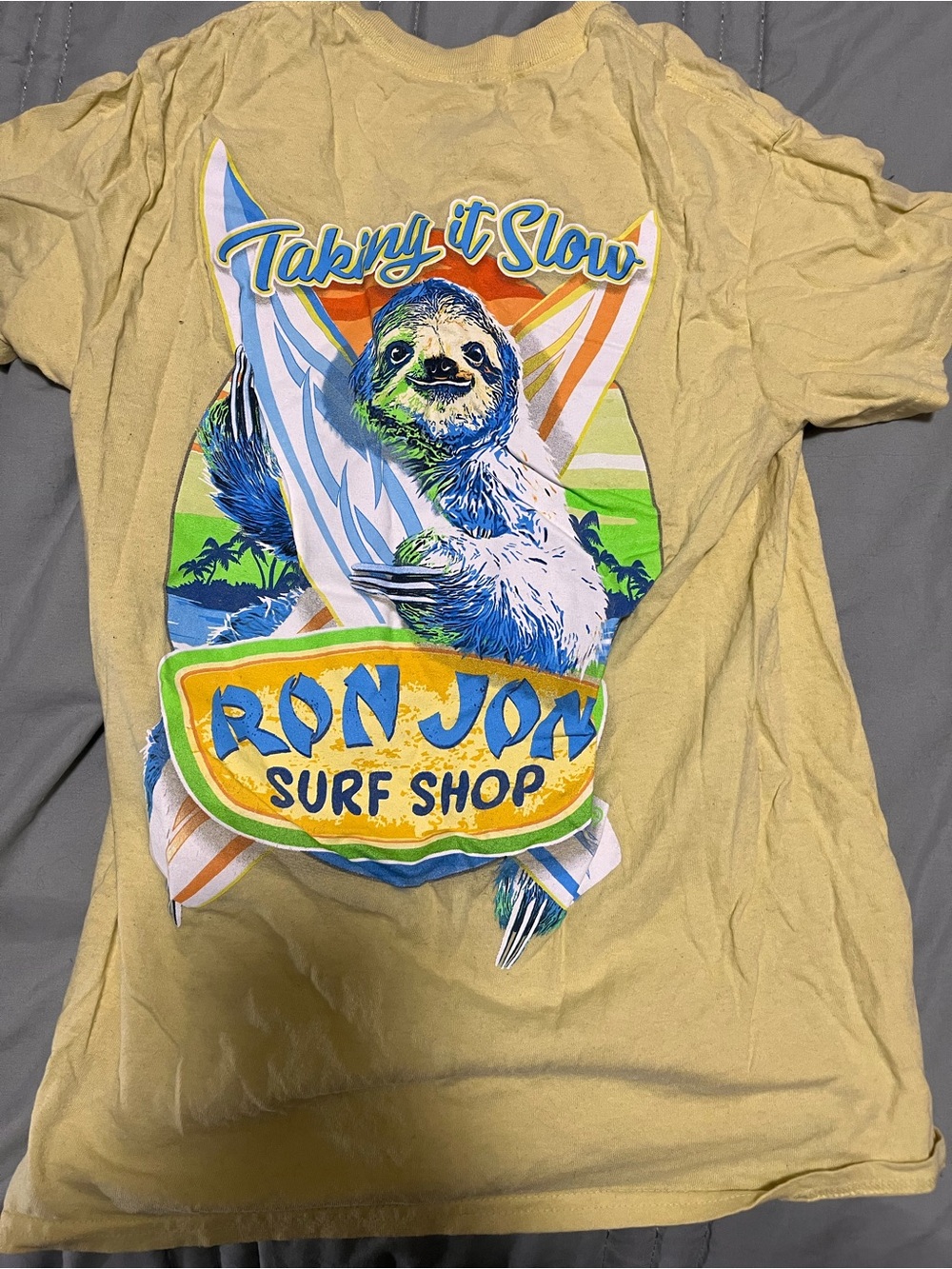 Ron Jon Yellow Tee with Colorful Sloth Surf Graphic